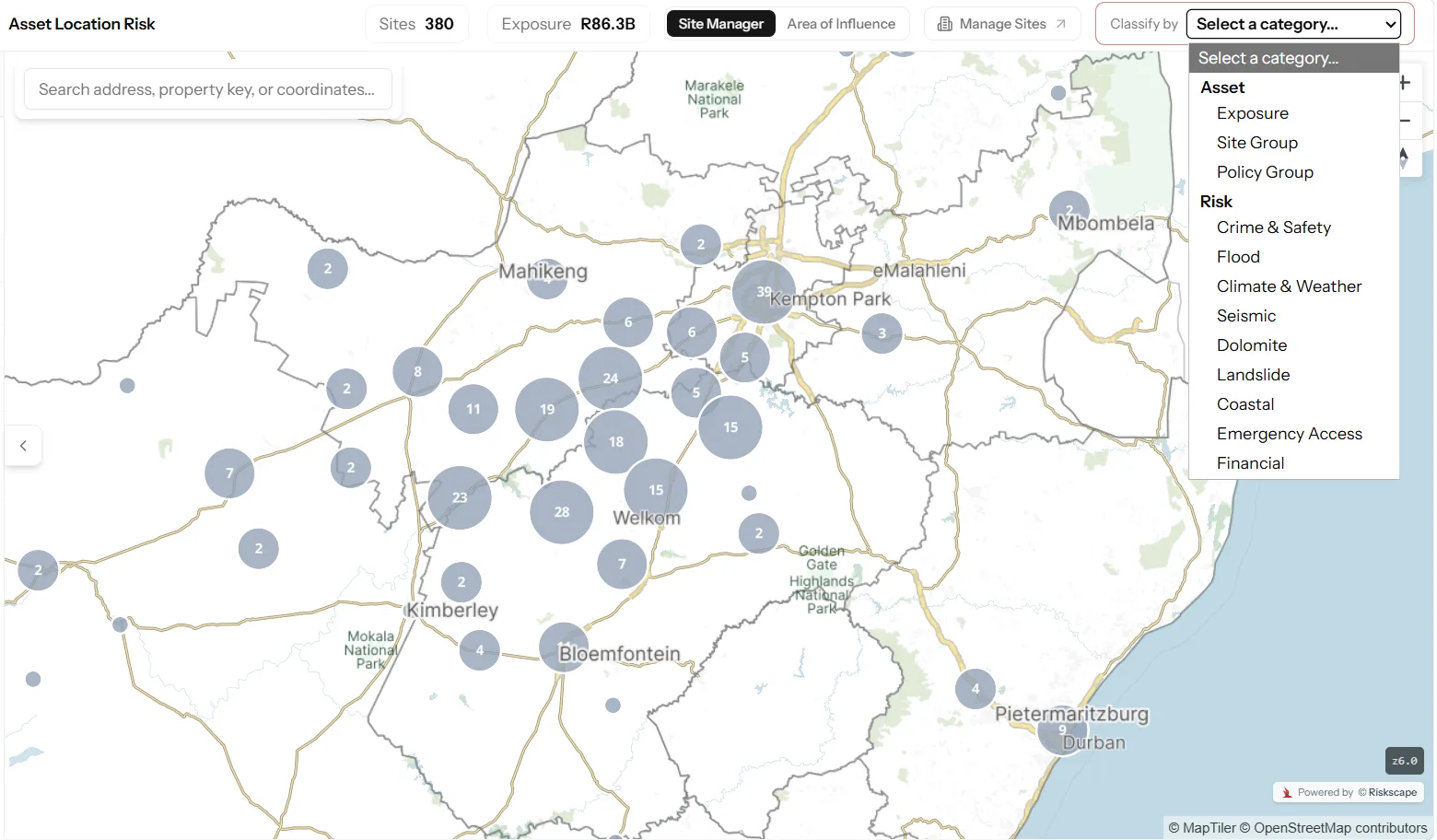 Riskscape Site Manager showing the Classify by menu with Asset and Risk categories over a clustered map of South Africa